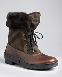 Burberry captures retro, Adirondack style in these mixed-media boots topped off with plus faux fur perfect for frosty, wet weather-or the chic vegans on your gift list.