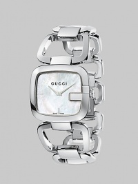 A signature style with a mother-of-pearl dial and a stainless steel bracelet. Quartz movementWater resistant to 3 ATMSquared stainless steel case, 32mm (1.2) X 30mm (1.1)Smooth bezelWhite mother-of-pearl dial with markersStainless steel link braceletMade in Switzerland 