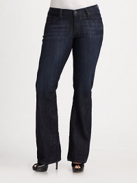 This flattering high-waist bootcut fit features soft distressing for a modern look.THE FITFitted through hips and thighs High-rise Inseam, about 34THE DETAILSZip fly with button closure Five-pocket style 70% cotton/27% polyester/3% Lycra spandex Machine wash Made in the USA of imported fabric