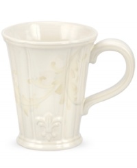 With embossed lilies and golden leaves, Portmeirion's decorated Fleur de Lys mug sets tables in the French tradition. Classic, fluted stoneware in warm ivory lends distinct old-world elegance to everyday dining.