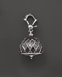 Inspired by Zen philosophy, this intricately detailed, blackened and polished sterling silver meditation bell from Paul Morelli jingles softly.