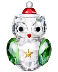 A holiday hoot, the rocking owl figurine sways gently from side to side in faceted Swarovski crystal. Green wings, a red hat and golden star make it extra irresistible.