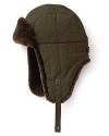 This classically rugged trapper features fur ear flaps and trim for natural warmth and softness.