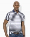 Sleek horizontal stripes lend a crisp, polished look to a relaxed-fitting polo shirt in breathable cotton mesh.