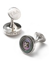 Turnbull & Asser engraving offsets mother-of-pearl insets and two-tone sterling silver on this ready-for-the-event cufflinks.