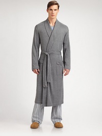 Luxurious, knit robe is incredibly smooth and soft for endless hours of comfort.Shawl collarTie waistFront patch pockets53% polyamide/47% viscoseMachine washImported