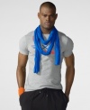 A sporty cotton jersey tee is adorned with vibrant race-inspired graphics for a modern, athletic look.