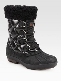 Lined with plush shearling, this lace-up essential combines quilted canvas and rich suede for a textured look. Shaft, 8Leg circumference, 11Coated canvas and suede upper with shearling trimSide zipShearling liningRubber trek solePadded insoleImported