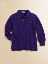 Classic long-sleeved polo shirt in soft, breathable cotton mesh.Ribbed polo collarLong sleeves with ribbed cuffsButton-frontUneven vented hemCottonMachine washImported Please note: Number of buttons may vary depending on size ordered. 