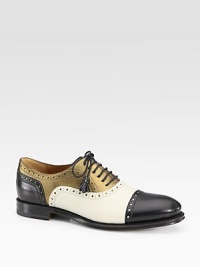 Oxford-inspired leather with metallic leather trim and tassel laces. Stacked heel, 1 (25mm)Nappa leather and metallic leather upperLeather lining and solePadded insoleMade in ItalyOUR FIT MODEL RECOMMENDS ordering one half size down as this style runs large. 