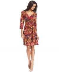 AGB's faux wrap dress is fall perfection with a vibrant print in autumnal hues.