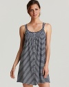 A darling striped tank gown with double straps, button front and smocking at neckline.