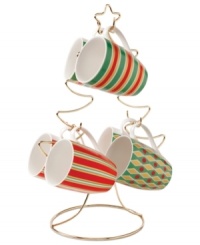 Enjoy hot drinks in a holiday setting with the Festive Yuletide mug set. Six mugs with cheery patterns hang from metal branches in a tree-shaped stand.