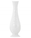 Featuring the embossed vine motif and shiny white glaze of the Opal Innocence Carved collection, this shapely bud vase is designed to refine your home indefinitely. A lovely bridal shower gift!