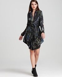 Dare to dazzle in pure silk--this Edun dress embraces the timeless trend of animal prints that lead the pack for fall in rich, unique hues.