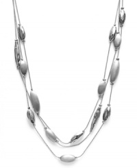 Layers of shining accents stack up classic style on Charter Club's four-row necklace. Finished with a toggle closure. Crafted in brushed silver tone mixed metal. Approximate length: 18 inches. Approximate drop: 1 inch.