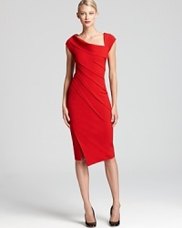 This sculpted Donna Karan New York dress has unique seam detail and a daring front slit for dramatic date night impact.