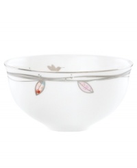 Hummingbirds twirl and buzz from flowery pink leaves to blue on dreamy bone china dessert bowls from Lenox Lifestyle dinnerware. The dishes from the Silver Song collection are crisscrossed with platinum branches and abound with fanciful springtime delight and irresistible modern charm. (Clearance)