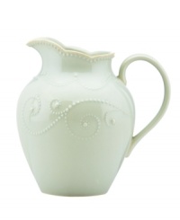 With fanciful beading and a feminine edge, this Lenox French Perle pitcher has an irresistibly old-fashioned sensibility. Hardwearing stoneware is dishwasher safe and, in an ethereal ice-blue hue with antiqued trim, a graceful addition to every meal.