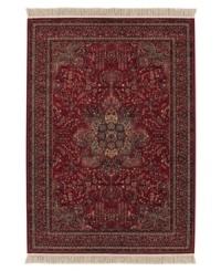 The Couristan Kashimar area rug is inspired by classic Oriental and Persian motifs, featuring a richly detailed design in warm red with grey florals. With features like 100% New Zealand semi-worsted wool, Couristan's exclusive locked in weave, crystal-point finish and hand-knotted fringes, the Medallion Antique Red rug offers a sophisticated addition to any room of your home.