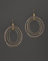 A mix of hoops in white, rose and yellow gold make up these artful earrings from Lana.