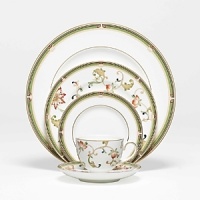 Oberon's delicate floral pattern recalls the first blossoms of spring, yet is understated enough to complement any table decor. Bone china.