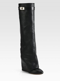 A metal turn-lock adds polish to this ultra-tall foldover silhouette, crafted of rich pebble-grain leather. Self-covered heel, 4¾ (120mm)Shaft, 16½Leg circumference, 13Leather upperLeather lining and solePadded insoleMade in ItalyOUR FIT MODEL RECOMMENDS ordering one size up as this style runs small. 