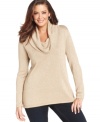 Stay chic in the cold with Jones New York Signature's metallic plus size sweater, finished by a cowl neckline.