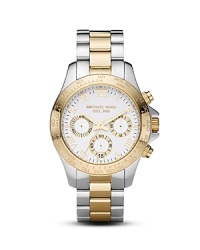 This classic two-tone watch from MICHAEL Michael Kors boasts a three-eye dial and quartz movement.