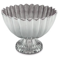 A stunning centerpiece, perfect for your favorite drink or as an ice bucket for champagne. The Peony Pedestal Gala Bowl from Julia Knight is handmade in sandcast aluminum and decorated with a trademark blend of enamel infused with crushed mother of pearl. The artfully scalloped interior is modeled after flower petals.