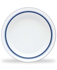 Named for a trendy Copenhagen neighborhood but designed with timeless style, the Christianshavn Blue rim soup bowl features a double band of navy in pristine white porcelain. From Dansk.