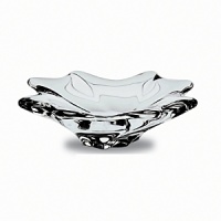 Sensuous undulations play with the light in this curvy crystal bowl.