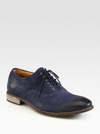 Derby style lace-up, crafted in burnished navy leather, lends the look and feel of a well-worn favorite.Leather upperLeather liningPadded insoleLeather soleMade in Italy