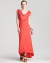 A drapey cowlneck and high/low hem adds interest to this vibrantly hued XCVI maxi dress.