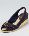 In dark denim with a walkable heel, these Lauren Ralph Lauren wedges beckon off-duty days and picnics in the park.