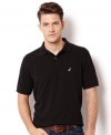 All hands on deck for style with this classic polo shirt from Nautica.