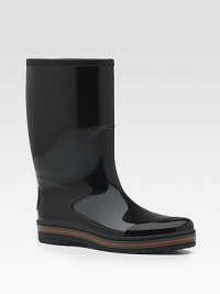 Rubber rain boot with signature trim and interlocking G on back.Rubber upperRubber soleMade in ItalyPlease note: For best fit please size down one full size.