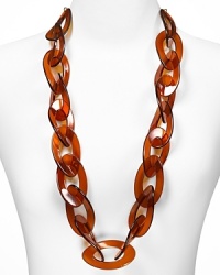 The 60's-inspired look of this tortoise shell link necklace from Kenneth Jay Lane makes it a Mod-chic way to punctuate every outfit. It's vintage perfect with this season's punchiest prints and a pair of platforms.