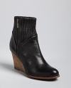 Take your favorite Frye styling to work in these dress-up, dress-down wedge booties.