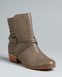 Joie delivers a low-key, highly wearable interpretation of the Western bootie trend in this design, with subtle tonal woven leather and wrap buckle accents.