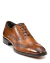 These polished To Boot New York lace-up shoes tout chic wing tip details, for a smart nod to timeless style.