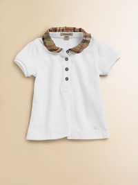 Casual yet chic, this classic top is reinvented with a ruffled check collar.Ruffled check collar Partial front button closure Short sleeves Embroidered logo at the hem Cotton Machine wash Imported Please note: Number of buttons may vary depending on size ordered. 