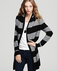 Layer up and go long for fall in this soft knit cardigan, striped in neutral hues for extra versatility.