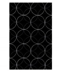 Interlocking circles create a lush geometric pattern that help shape any room on this bold black area rug from Surya. Hand-tufted from poly-acrylic fibers that provide luxurious softness without shedding, this rug adds a striking, easy-maintenance accent to any living space.