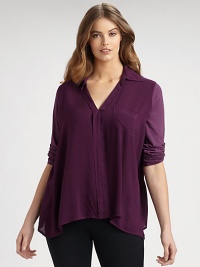 An airy top with raw-edge details that offers a relaxed, boxy fit.V-neckTab sleevesOne front pocketAbout 30 from shoulder to hemRayonHand washMade in USA