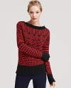 This soft wool Theory sweater flaunts an eye-catching seasonal print with classic ribbed knit details for cozy-chic.