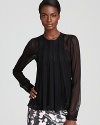 Pleated detailing and soft silk on this DIANE von FURSTENBERG's Fannie blouse are brilliant touches for a feminine feel.