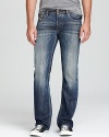 Comfortably cool, these 5-pocket jeans are updated with fading on the knees and thighs and a trendy bootcut.