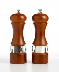 Add depth to any dish and décor with classic salt and pepper mills interpreted for the contemporary kitchen. The tall, beautifully contoured bodies are finished in elegant walnut, offset with a see-through stripe of acrylic that lets you view the mill's contents. Limited lifetime warranty.