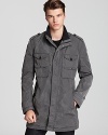 HUGO BOSS' Ogil jacket lends utilitarian style with a water-resistant shell--a thickly lined collar adds a cozy touch.